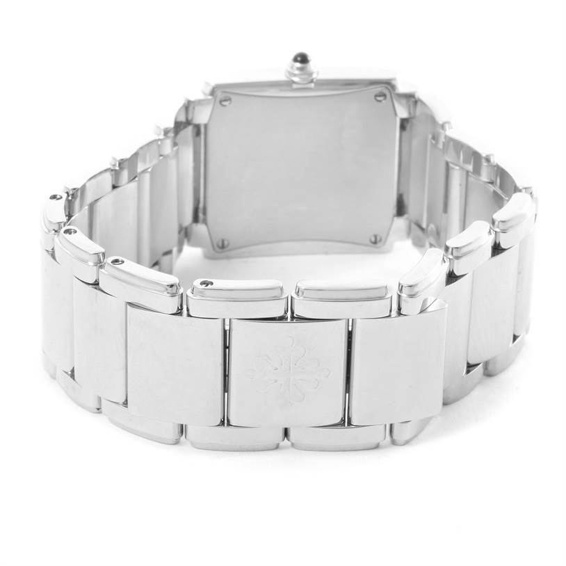 The image shows the back view of a Patek Philippe Twenty-4 4910/10A-010 Women's Stainless Steel Grey Dial 4910/10A-010 Women's Stainless Steel Grey Dial watch, highlighting the case back and metal bracelet.