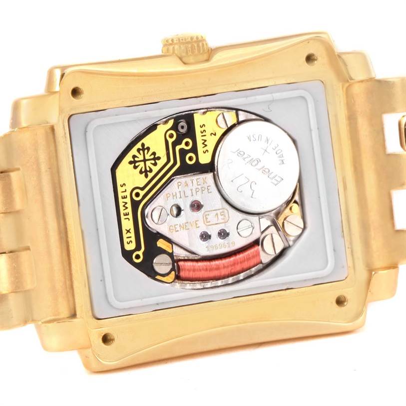 This image shows the back of the Patek Philippe Gondolo 4824 Women's Yellow Gold White Dial 4824 Women's Yellow Gold White Dial watch, revealing its internal mechanism and components.