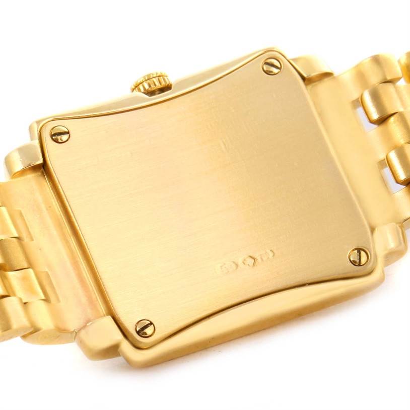 This image shows the back case and part of the bracelet of the Patek Philippe Gondolo 4824 Women's Yellow Gold White Dial 4824 Women's Yellow Gold White Dial watch.