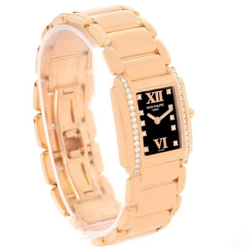 The image shows a Patek Philippe Twenty-4 4908/11R Women's Rose Gold Black Dial 4908/11R Women's Rose Gold Black Dial model watch at a slight angled view, displaying its bracelet and diamond-accented face.