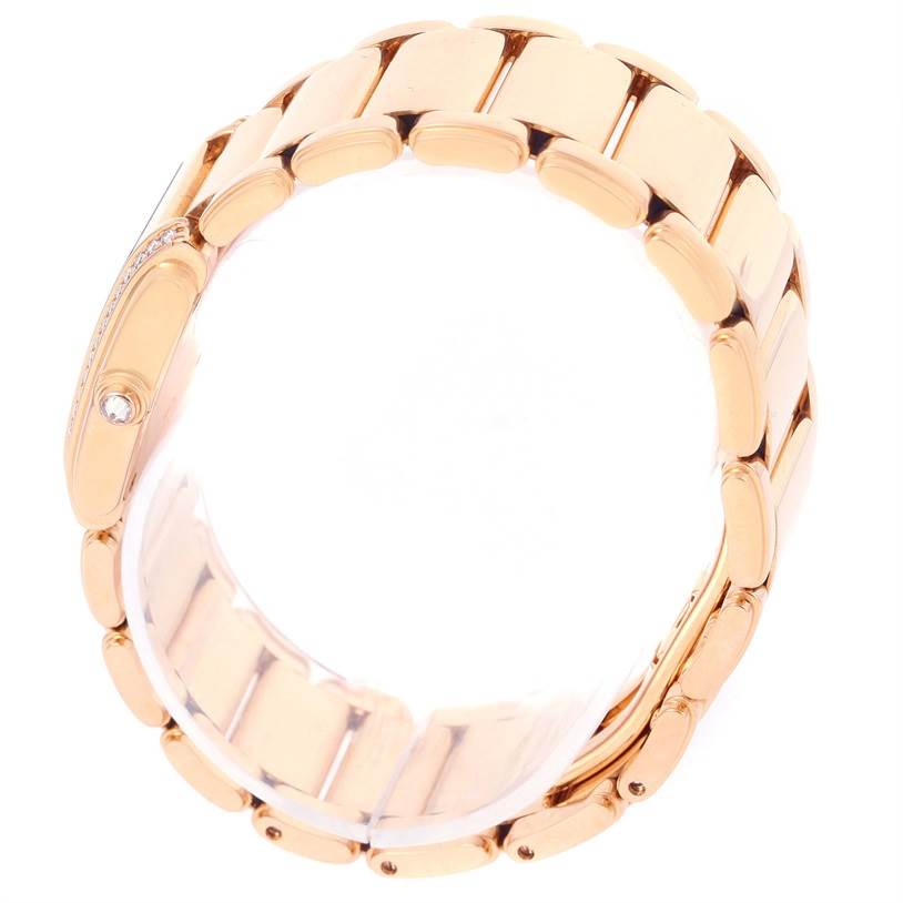 The image shows a side view of the bracelet of a Patek Philippe Twenty-4 4908/11R Women's Rose Gold Black Dial 4908/11R Women's Rose Gold Black Dial watch, focusing on the gold links and clasp.