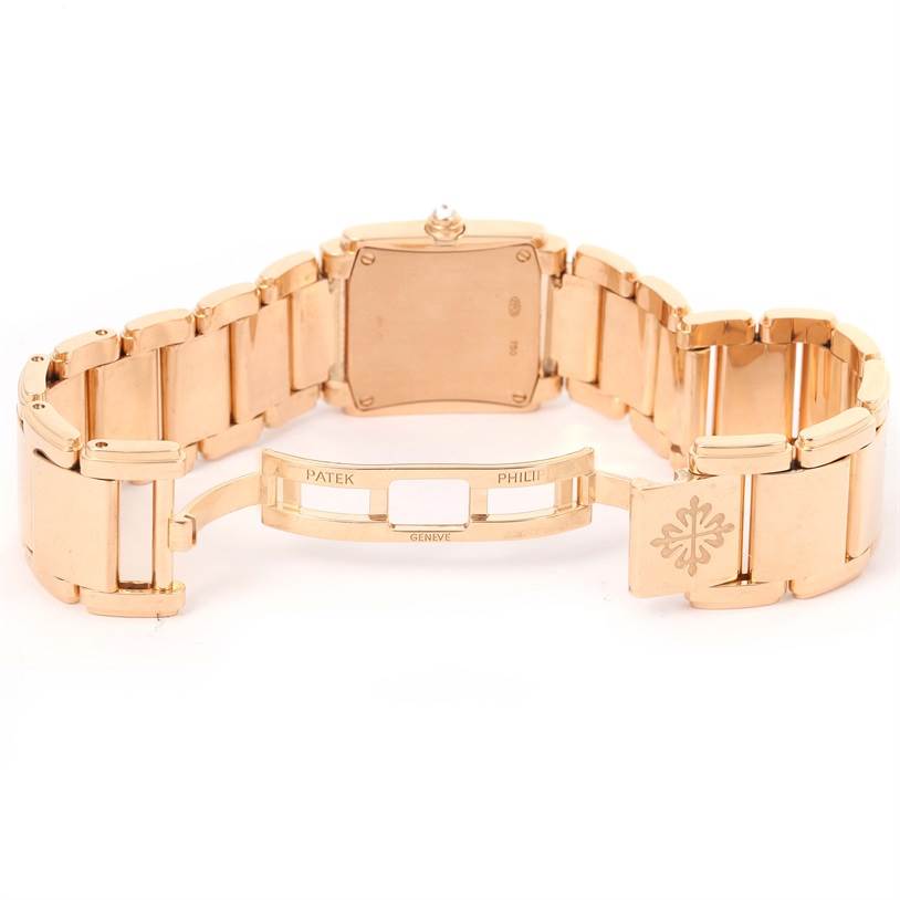 This image shows the opened bracelet and clasp of a Patek Philippe Twenty-4 4908/11R Women's Rose Gold Black Dial 4908/11R Women's Rose Gold Black Dial watch from a rear angle.