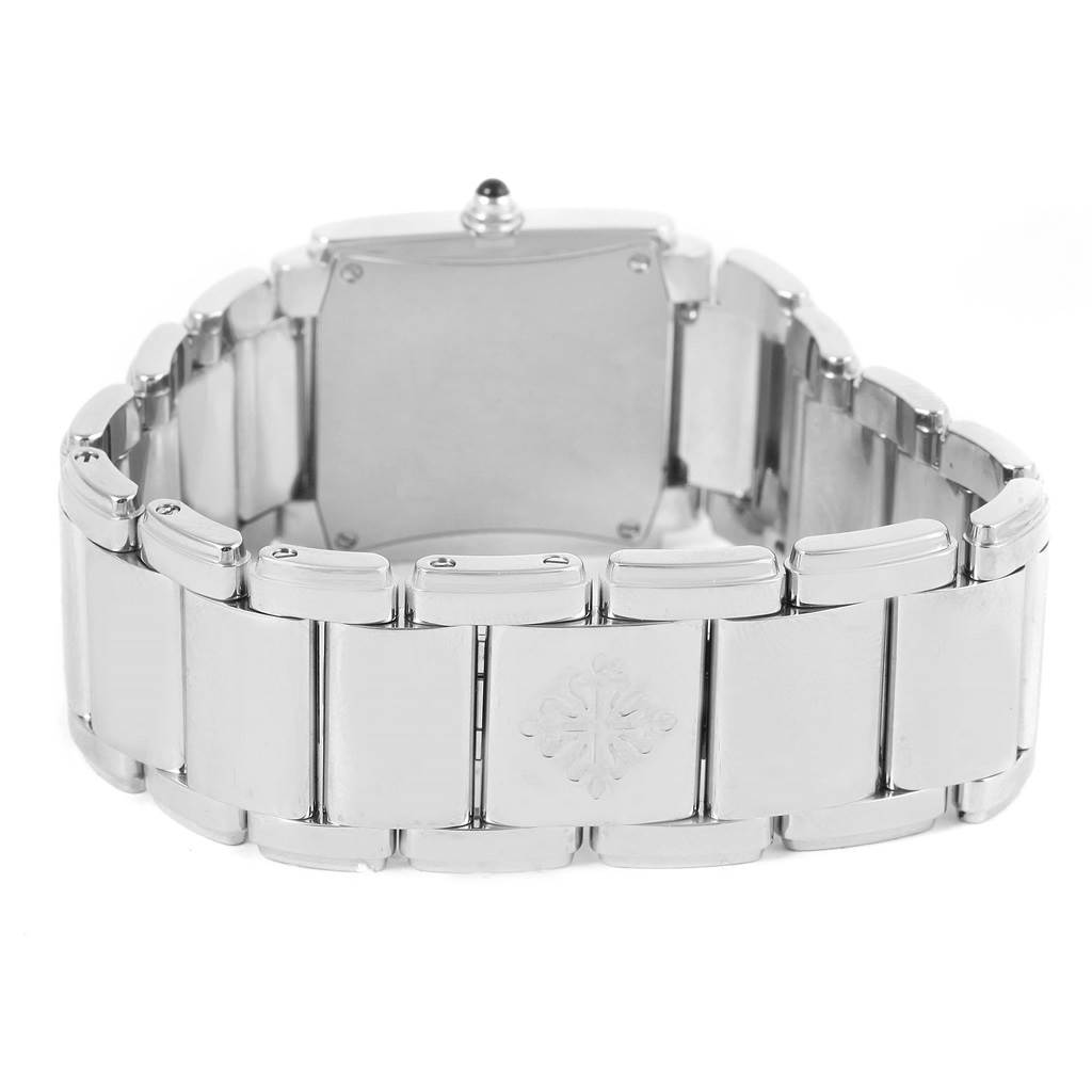 The image shows the back view of a Patek Philippe Twenty-4 4910/10A-001 Women's Stainless Steel Black Dial 4910/10A-001 Women's Stainless Steel Black Dial model watch, highlighting its clasp and bracelet.