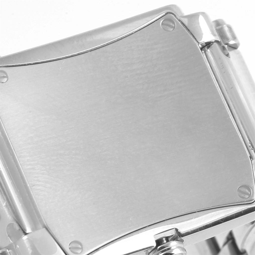 This image shows the back case of a Patek Philippe Twenty-4 4910/10A-001 Women's Stainless Steel Black Dial 4910/10A-001 Women's Stainless Steel Black Dial watch viewed from a close-up angle.
