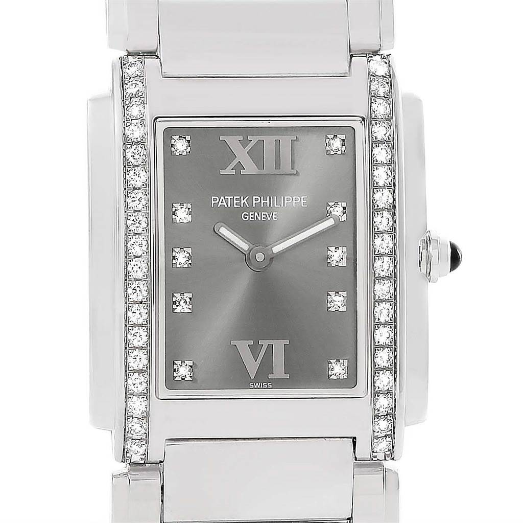 This image shows a front angle view of a Patek Philippe Twenty-4 4910/10A-010 Women's Stainless Steel Grey Dial 4910/10A-010 Women's Stainless Steel Grey Dial watch, highlighting the face, diamond markers, and case.