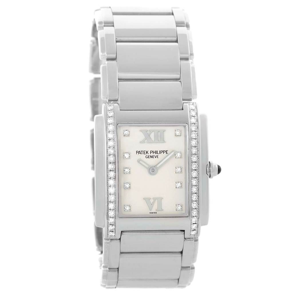 The image shows a front view of the Patek Philippe Twenty-4 4910 Women's Stainless Steel Silver Dial 4910 Women's Stainless Steel Silver Dial watch, highlighting its face, bracelet, and diamond details.