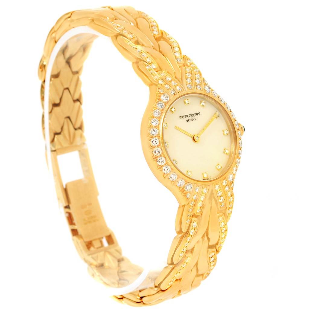 The image shows a Patek Philippe La Flamme  4816 Women's Yellow Gold Beige Dial 4816 Women's Yellow Gold Beige Dialwatch at a side angle, displaying the watch face, bezel, and part of the band.
