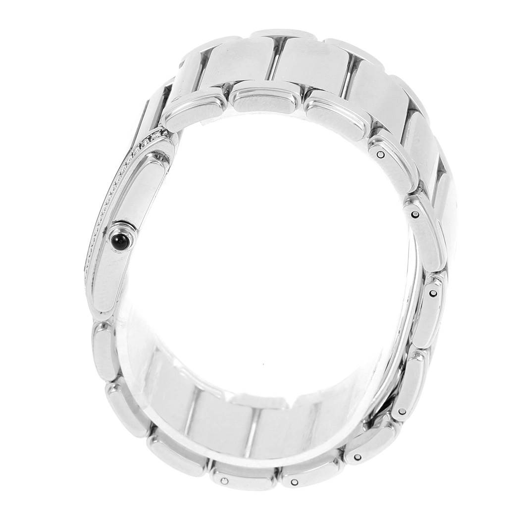 The image shows the side view of a Patek Philippe Twenty-4 4910-10A-001 Women
s Stainless Steel Black Dial 4910-10A-001 Women
s Stainless Steel Black Dial watch, focusing on the bracelet and the crown.