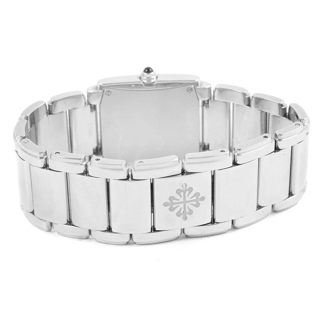 The image shows the back view of a Patek Philippe Twenty-4 4910-10A-001 Women
s Stainless Steel Black Dial 4910-10A-001 Women
s Stainless Steel Black Dial model watch, focusing on its stainless steel bracelet and clasp.