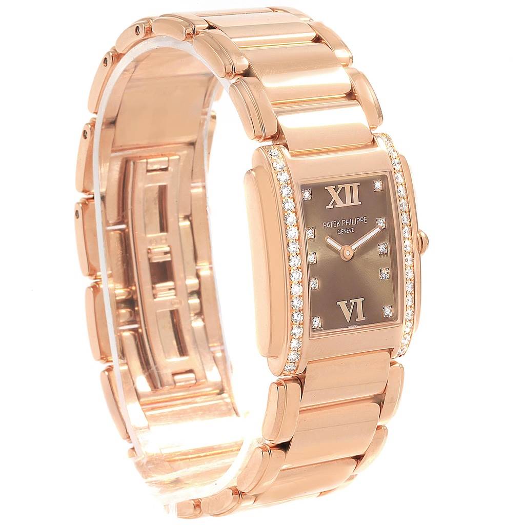 This image shows a side and frontal view of the Patek Philippe Twenty-4 4910/11R Women's Rose Gold Brown Dial 4910/11R Women's Rose Gold Brown Dial watch, highlighting its face, bezel, and bracelet.