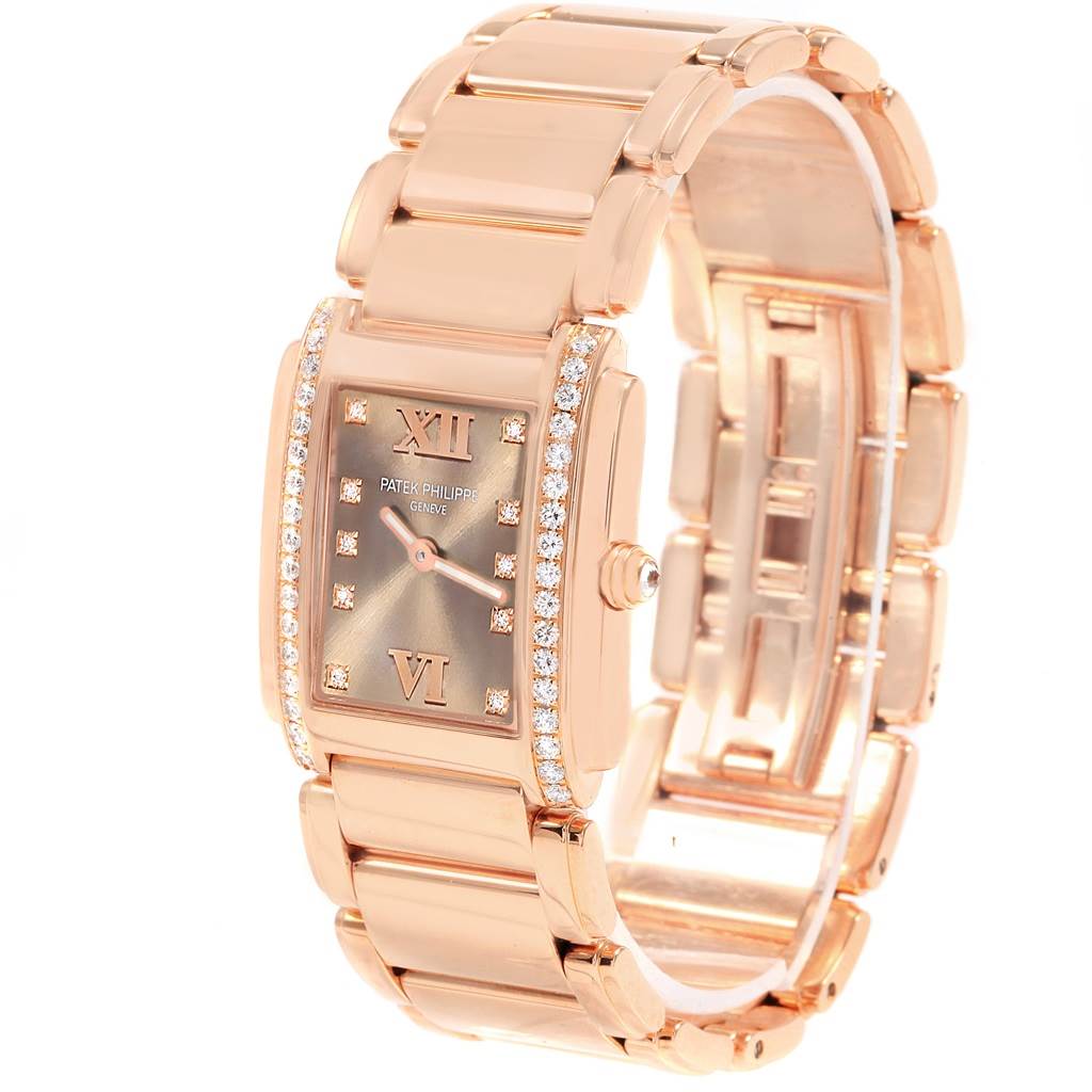The image shows a Patek Philippe Twenty-4 4910/11R Women's Rose Gold Brown Dial 4910/11R Women's Rose Gold Brown Dial watch at a slight angle, highlighting the rectangular face, bracelet, and diamond accents.