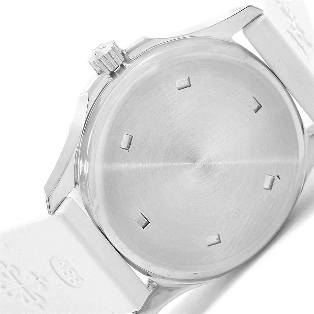 The image shows the back case and crown of the Patek Philippe Aquanaut 4960 Women's Stainless Steel Black Dial 4960 Women's Stainless Steel Black Dial watch.