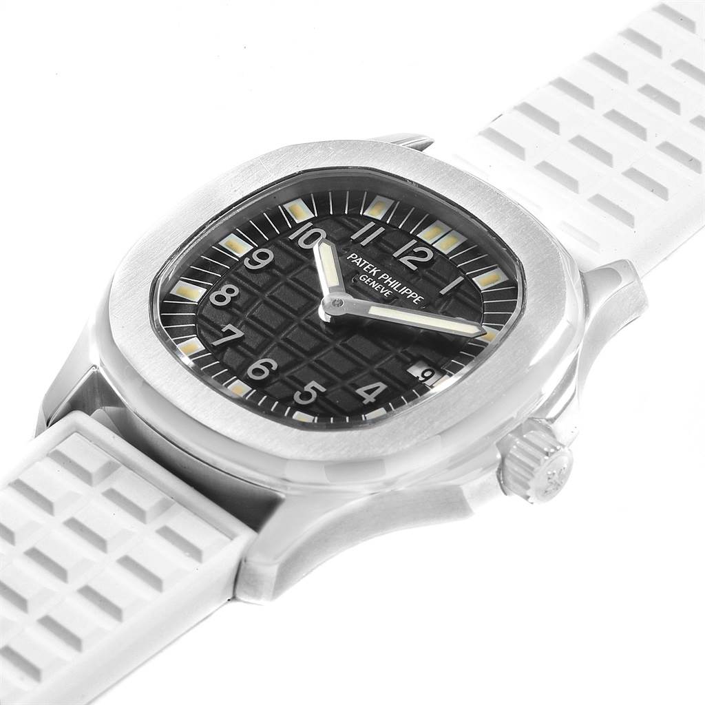 The image shows a Patek Philippe Aquanaut 4960 Women's Stainless Steel Black Dial 4960 Women's Stainless Steel Black Dial watch from a slightly tilted angle, highlighting the dial, bezel, crown, and white rubber strap.