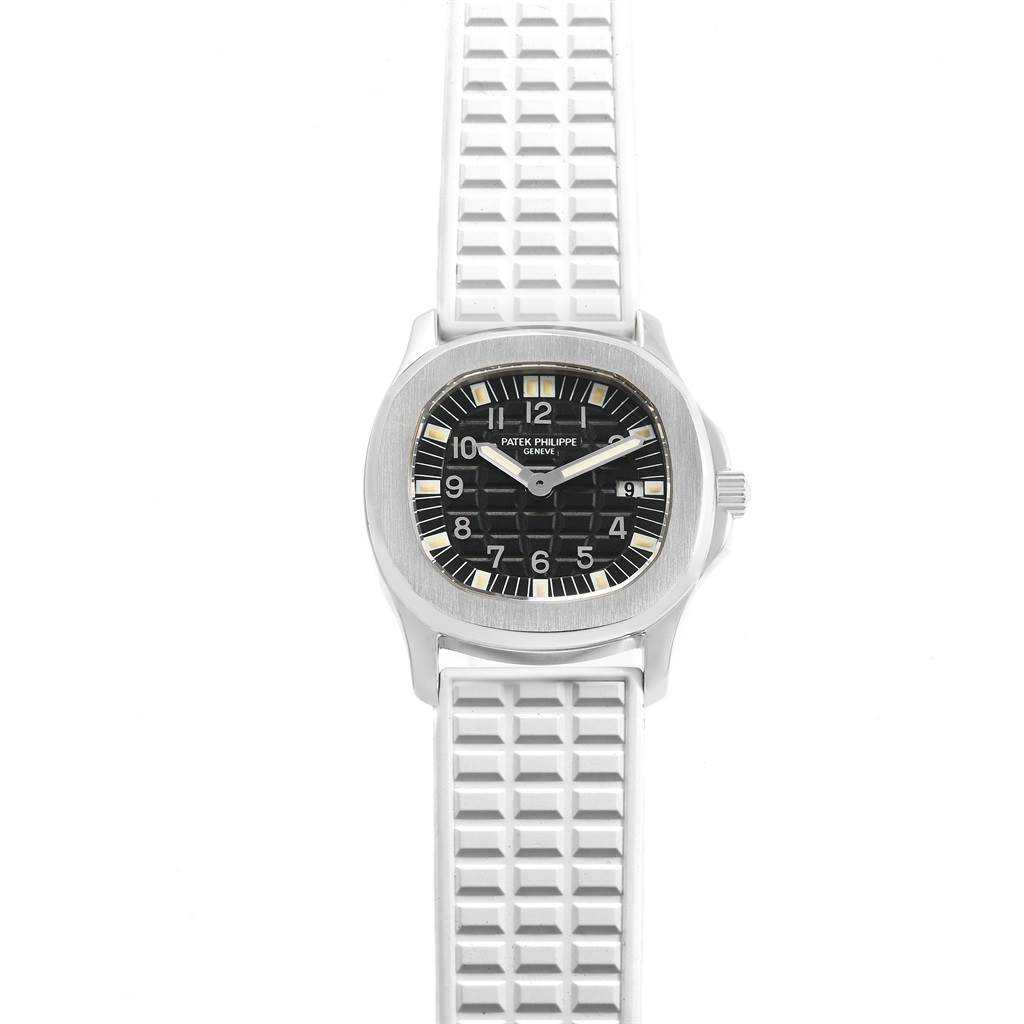 The image shows a front view of a Patek Philippe Aquanaut 4960 Women's Stainless Steel Black Dial 4960 Women's Stainless Steel Black Dial watch with a black dial and white textured strap.