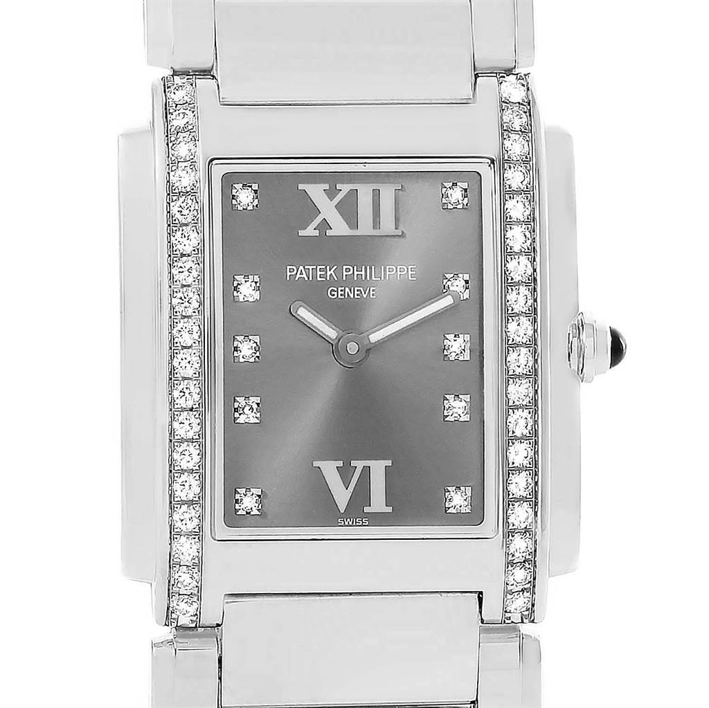This is a frontal view of the Patek Philippe Twenty-4 4910/10A-010 Women's Stainless Steel Grey Dial 4910/10A-010 Women's Stainless Steel Grey Dial watch, showing the face, diamond markers, and part of the bracelet.