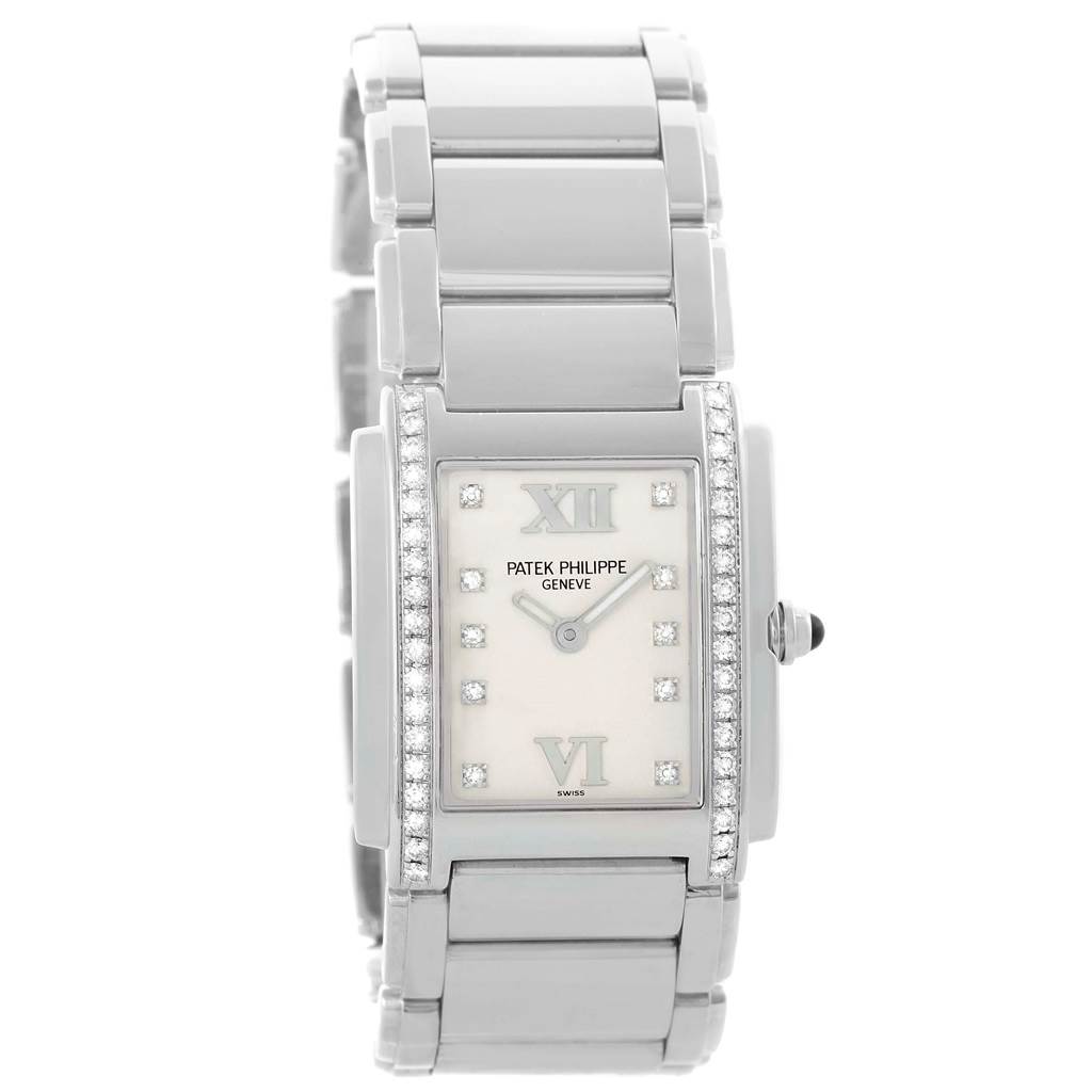 The image shows a front view of a Patek Philippe Twenty-4 4910 Women's Stainless Steel Silver Dial 4910 Women's Stainless Steel Silver Dial watch, highlighting its rectangular dial and bracelet.