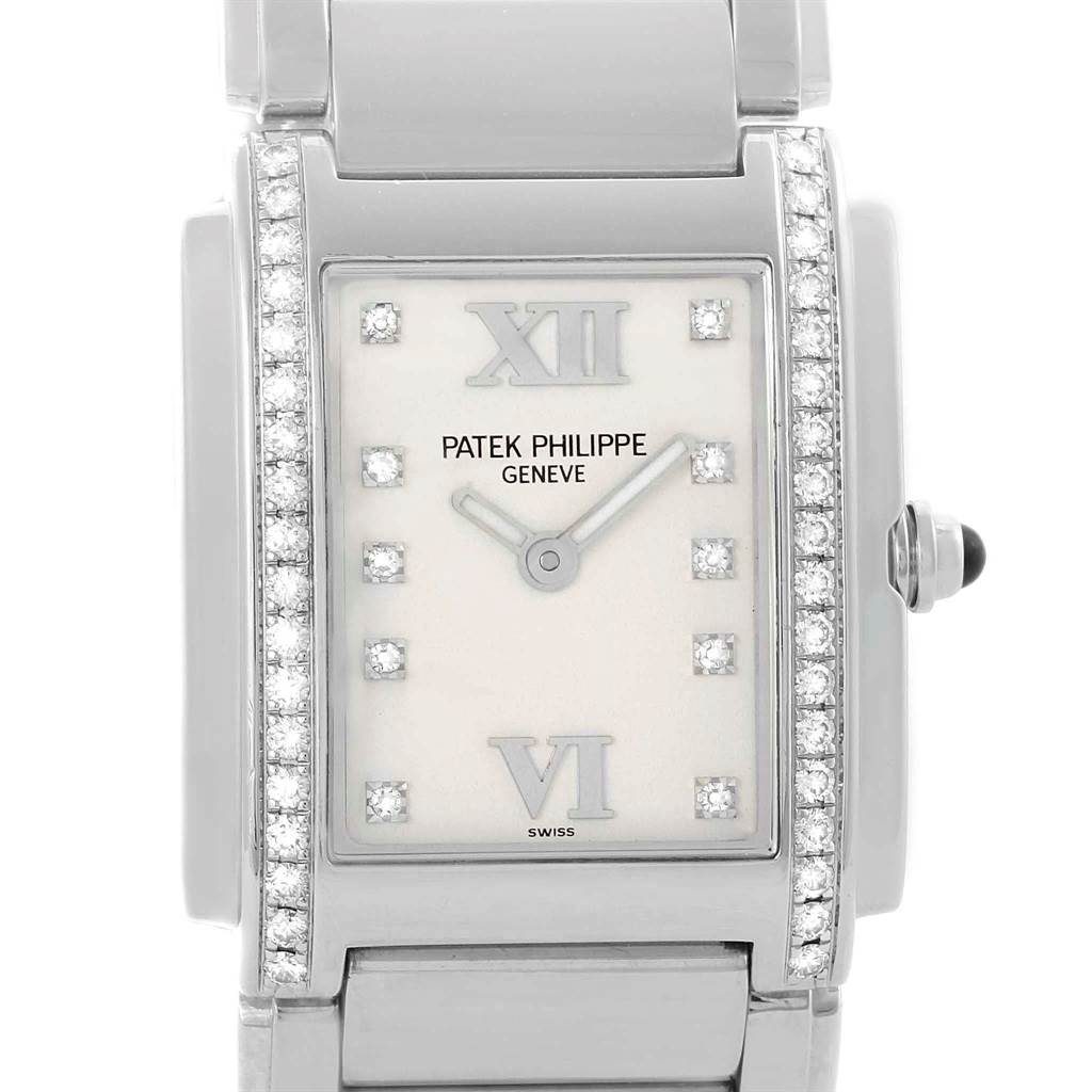 The image shows a frontal view of the Patek Philippe Twenty-4 4910 Women's Stainless Steel Silver Dial 4910 Women's Stainless Steel Silver Dial watch with a close-up of the dial, bezel, and part of the bracelet.