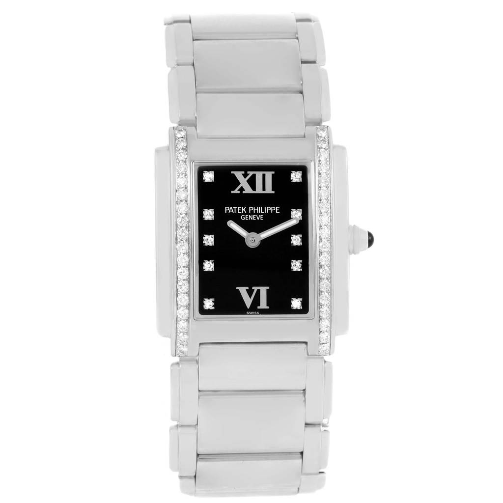 The image shows a front view of the Patek Philippe Twenty-4 4910 Women's Stainless Steel Black Dial 4910 Women's Stainless Steel Black Dial watch, highlighting its rectangular face with diamond accents.