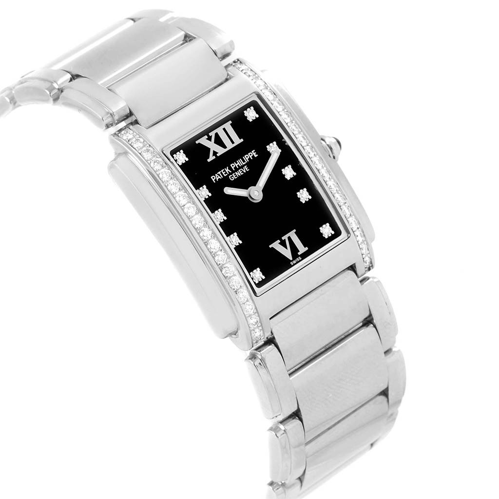 This image shows a Patek Philippe Twenty-4 4910 Women's Stainless Steel Black Dial 4910 Women's Stainless Steel Black Dial watch at a slight angle, highlighting its dial, diamond accents, and metal bracelet.