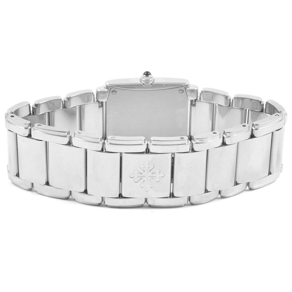 This image shows the back of the watch case and bracelet of the Patek Philippe Twenty-4 4910 Women's Stainless Steel Silver Dial 4910 Women's Stainless Steel Silver Dial model.
