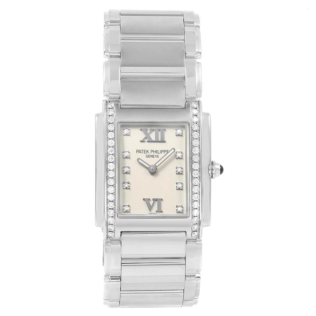 The image shows a frontal view of the Patek Philippe Twenty-4 4910 Women's Stainless Steel Silver Dial 4910 Women's Stainless Steel Silver Dial watch, highlighting the face, bezel, and bracelet.
