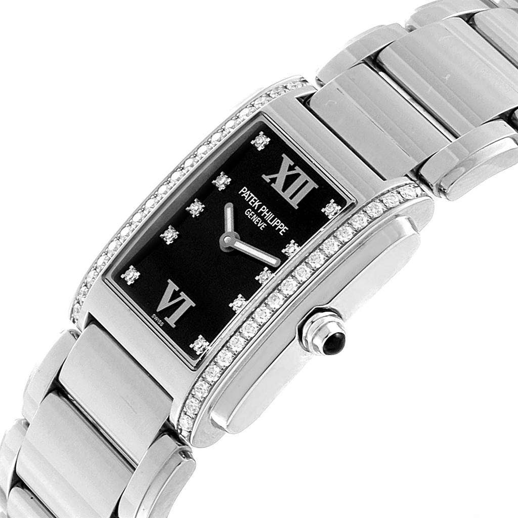 This image shows a close-up angle of the Patek Philippe Twenty-4 4910-10A-001 Women's Stainless Steel Black Dial 4910-10A-001 Women's Stainless Steel Black Dial watch, highlighting the face, bezel, crown, and part of the bracelet.