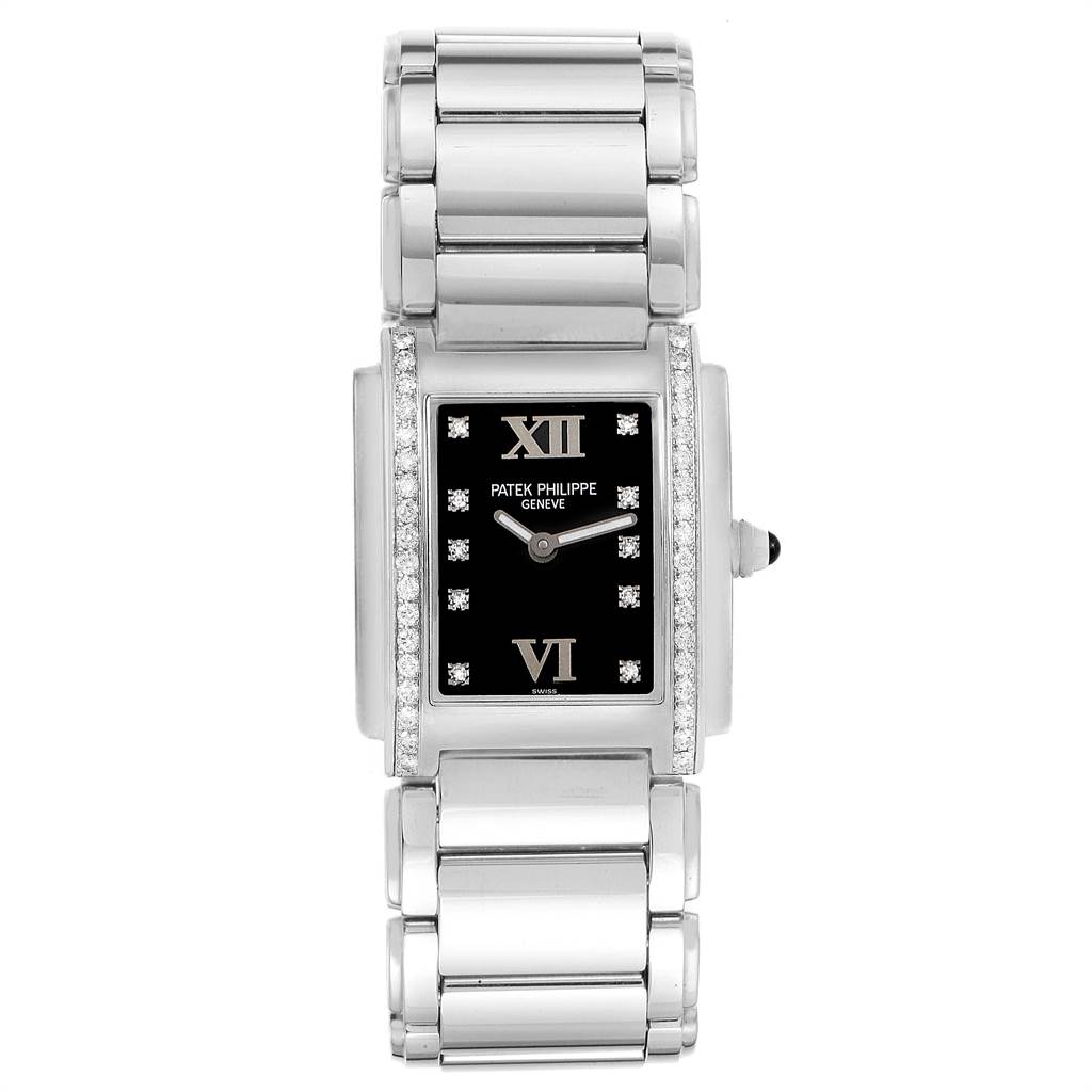 The image shows a front view of a Patek Philippe Twenty-4 4910-10A-001 Women's Stainless Steel Black Dial 4910-10A-001 Women's Stainless Steel Black Dial watch, detailing its rectangular face, diamond accents, and metal bracelet.