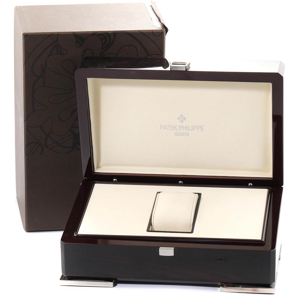 The image shows a Patek Philippe Twenty-4 4910/11R Women's Rose Gold Brown Dial 4910/11R Women's Rose Gold Brown Dial watch box, opened to display the luxurious interior.