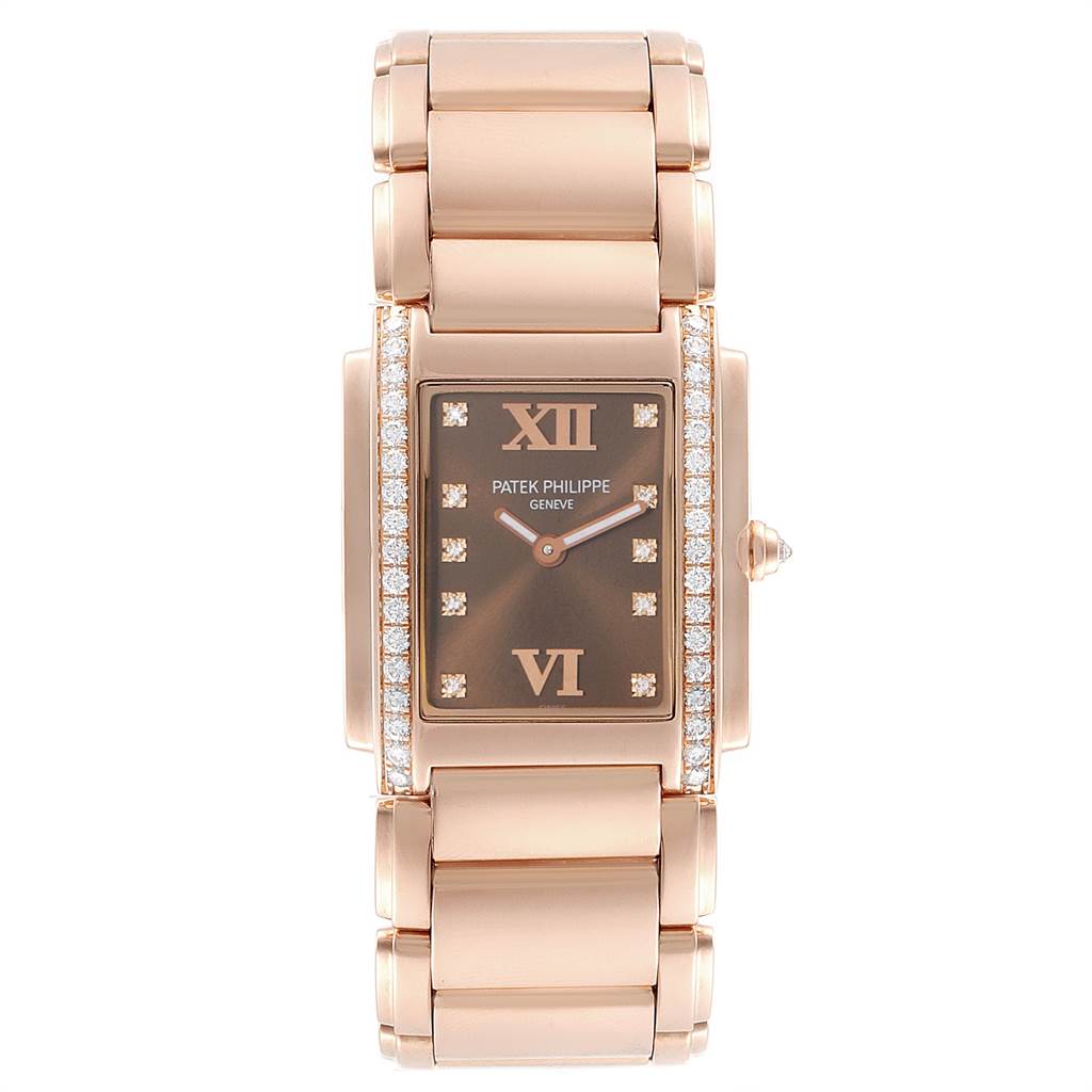 The image shows a Patek Philippe Twenty-4 4910/11R Women's Rose Gold Brown Dial 4910/11R Women's Rose Gold Brown Dial watch from a top-down angle, highlighting its rectangular face and bracelet.