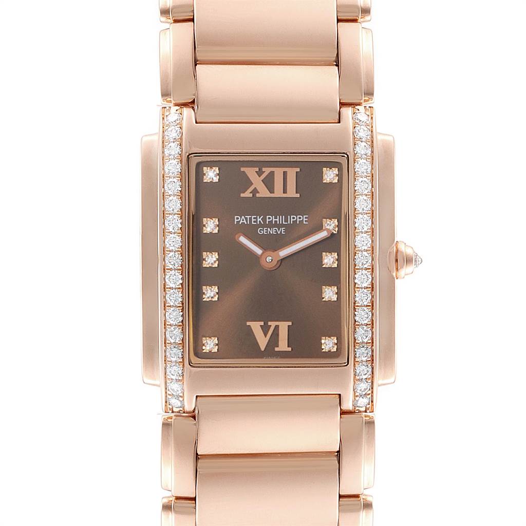 The image shows a front view of the Patek Philippe Twenty-4 4910/11R Women's Rose Gold Brown Dial 4910/11R Women's Rose Gold Brown Dial model, highlighting its dial, bracelet, and diamond embellishments.