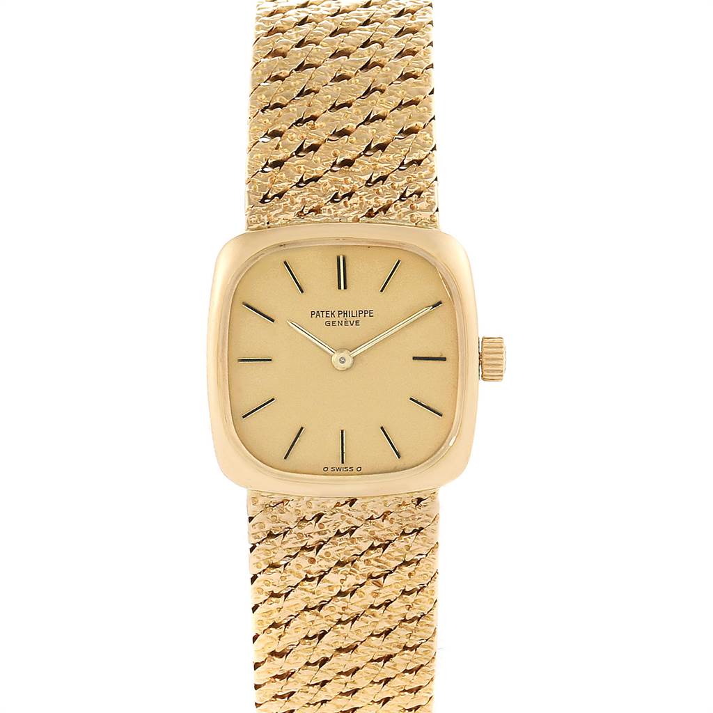 This image shows a front view of a Vintage Patek Philippe watch, highlighting its square dial and textured gold strap.