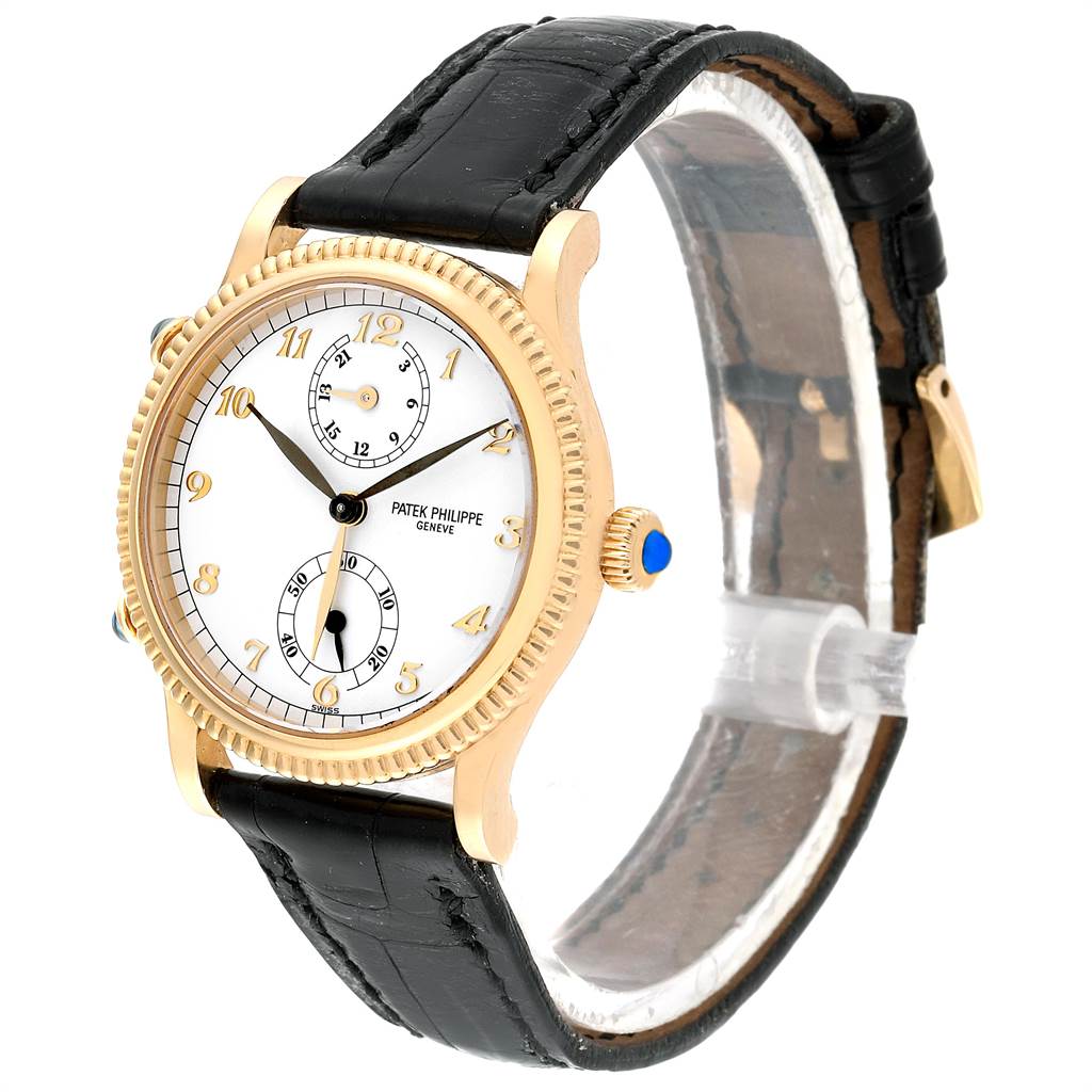 The image shows a Patek Philippe Calatrava 4864J Women's Yellow Gold White Dial 4864J Women's Yellow Gold White Dial watch at a three-quarter angle, highlighting the face, bezel, crown, and black leather strap.