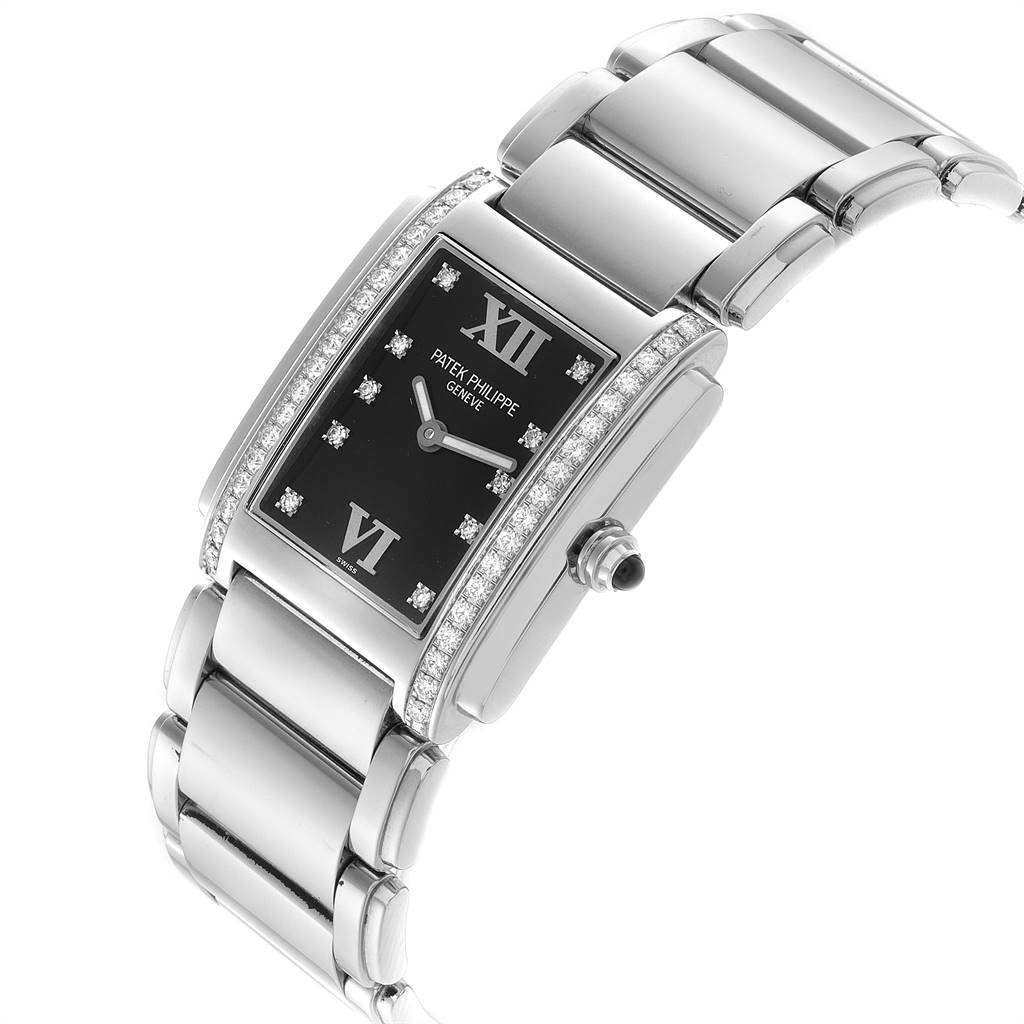 The Patek Philippe Twenty-4 4910-10A-001 Women's Stainless Steel Black Dial 4910-10A-001 Women's Stainless Steel Black Dial is shown from an angled perspective, highlighting the watch face, bezel, and bracelet.