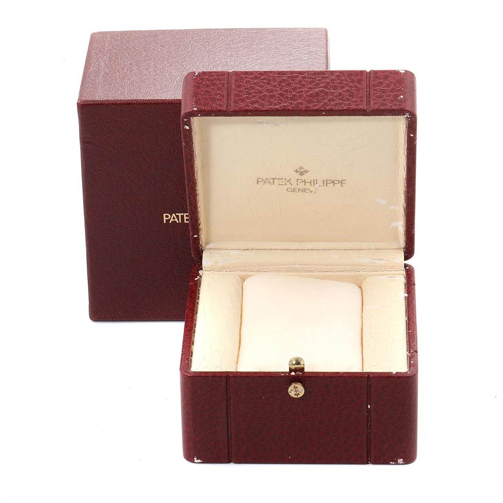 The image shows an empty, open box and outer packaging for a Patek Philippe Gondolo PATEK PHILIPPE Women's Yellow Gold White Dial PATEK PHILIPPE Women's Yellow Gold White Dial watch.