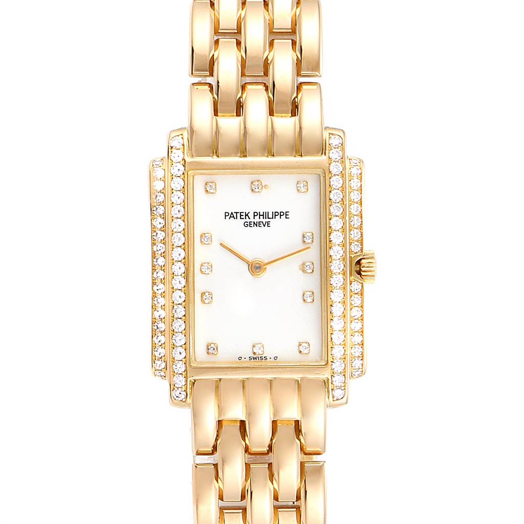 The image shows a Patek Philippe Gondolo PATEK PHILIPPE Women's Yellow Gold White Dial PATEK PHILIPPE Women's Yellow Gold White Dial watch in a frontal view, highlighting the rectangular face and gold bracelet with diamonds.