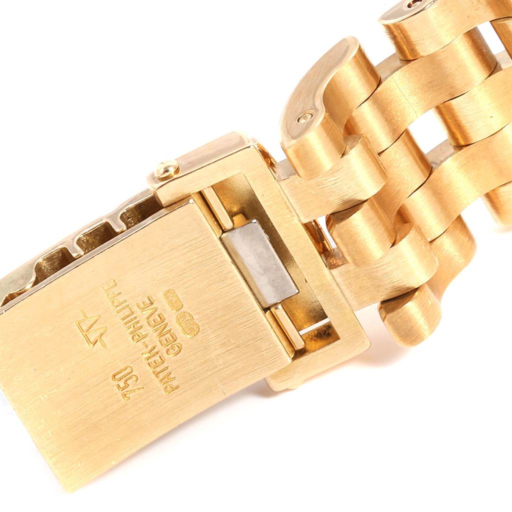 The image shows the clasp and part of the bracelet of a Patek Philippe Gondolo PATEK PHILIPPE Women's Yellow Gold White Dial PATEK PHILIPPE Women's Yellow Gold White Dial watch in a close-up view.