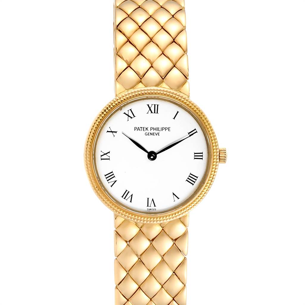 The image shows a front view of a Patek Philippe Calatrava 4819 Women's Yellow Gold White Dial 4819 Women's Yellow Gold White Dial watch, displaying its face and gold bracelet.