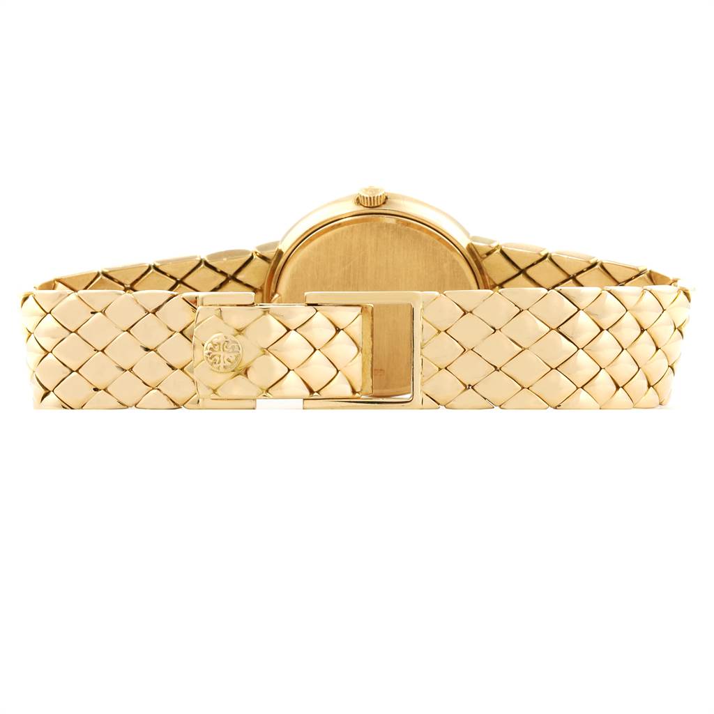 This image shows the gold back and clasp of a Patek Philippe Calatrava 4819 Women's Yellow Gold White Dial 4819 Women's Yellow Gold White Dial watch from a rear angle.