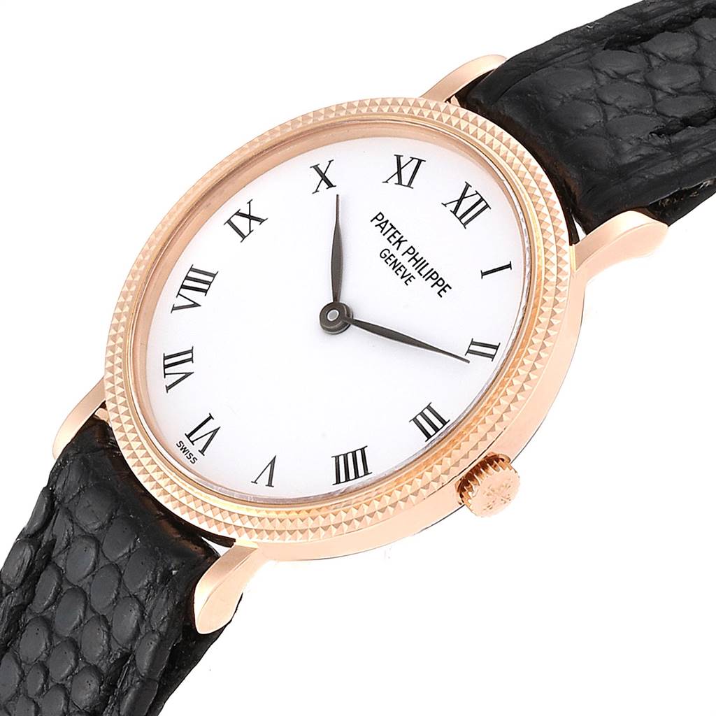 The Patek Philippe Calatrava 4819 Women's Yellow Gold White Dial 4819 Women's Yellow Gold White Dial watch is shown at a slight angle, displaying its face, bezel, crown, and black leather strap.