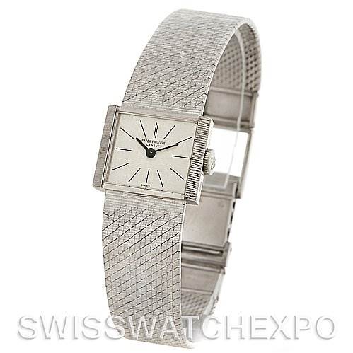 This image shows a vintage Patek Philippe watch from a slightly angled side view, displaying the watch face, crown, and detailed mesh band.