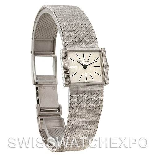 The image shows a side view of the Patek Philippe Vintage 3322 YEAR 1966 Women's White Gold Silver Dial 3322 YEAR 1966 Women's White Gold Silver Dial model, displaying its face, band, and partially open clasp.