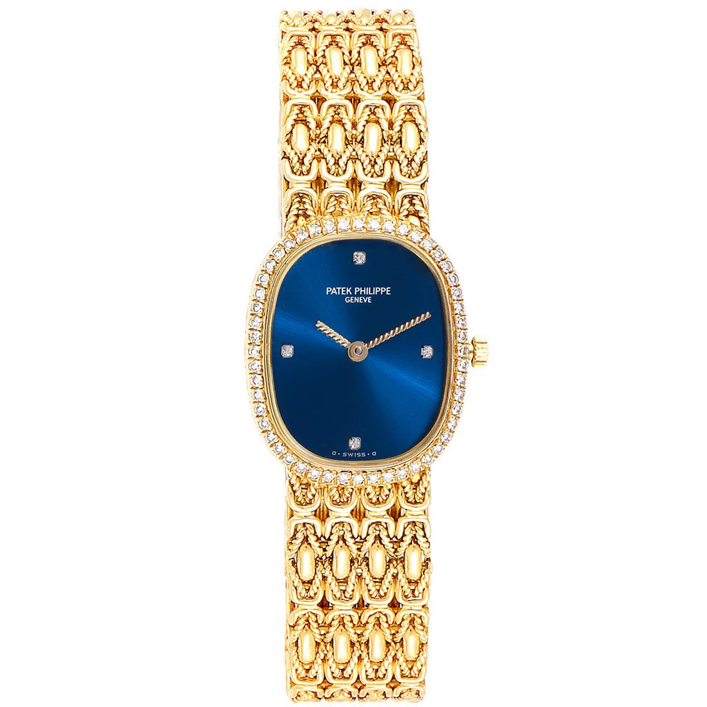 The image shows a frontal view of a Patek Philippe Golden Ellipse 4698/1 Women's Yellow Gold Blue Dial 4698/1 Women's Yellow Gold Blue Dial watch, highlighting its blue dial, gold bracelet, and diamond-set bezel.