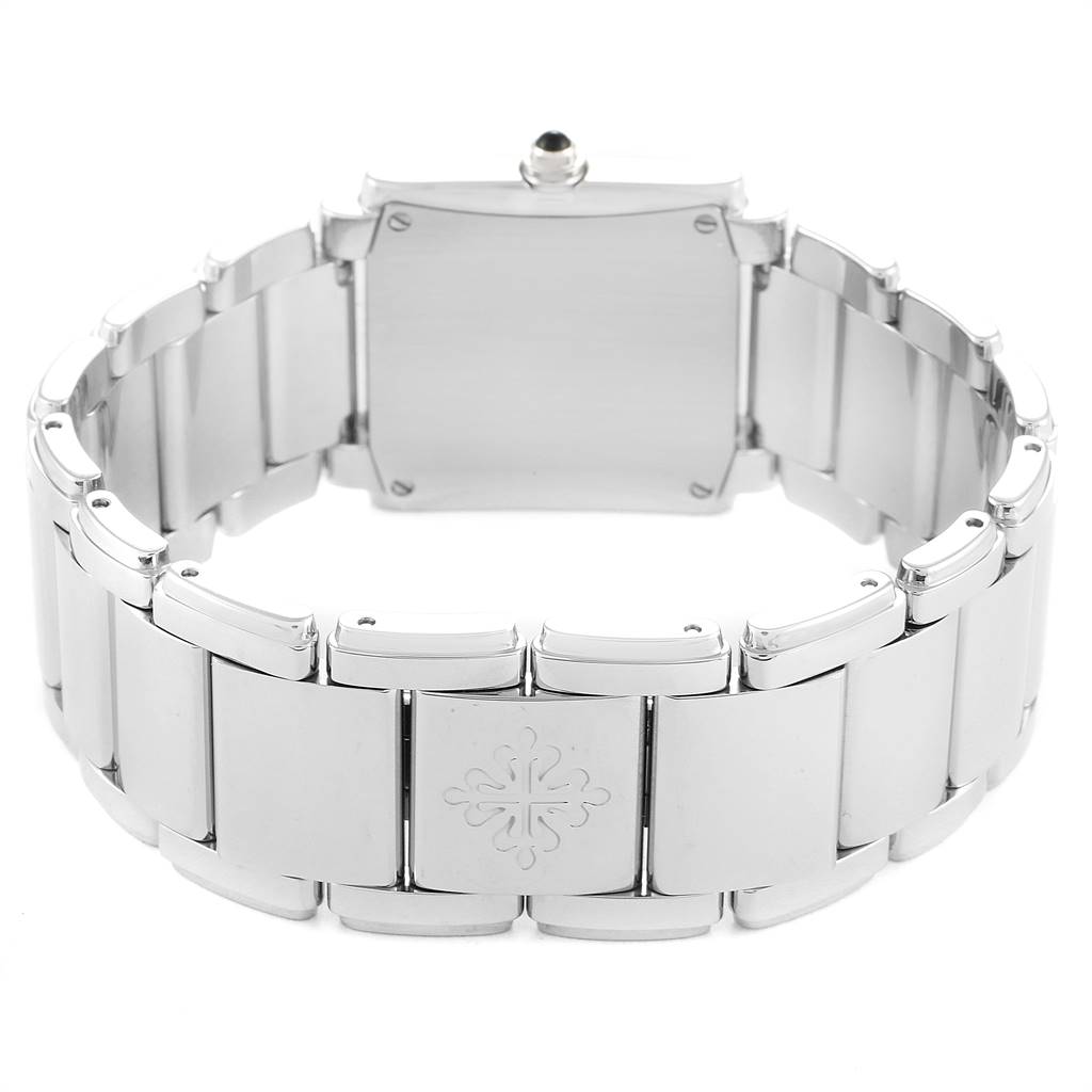 The image shows the back view of the Patek Philippe Twenty-4 4910-10A-012 Women's Stainless Steel Blue Dial 4910-10A-012 Women's Stainless Steel Blue Dial watch, highlighting its bracelet and clasp.