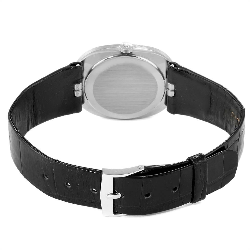 This image shows the back and side view of a Patek Philippe Golden Ellipse 3548 Women's White Gold Black Dial 3548 Women's White Gold Black Dial watch, displaying the case back and leather strap with buckle.