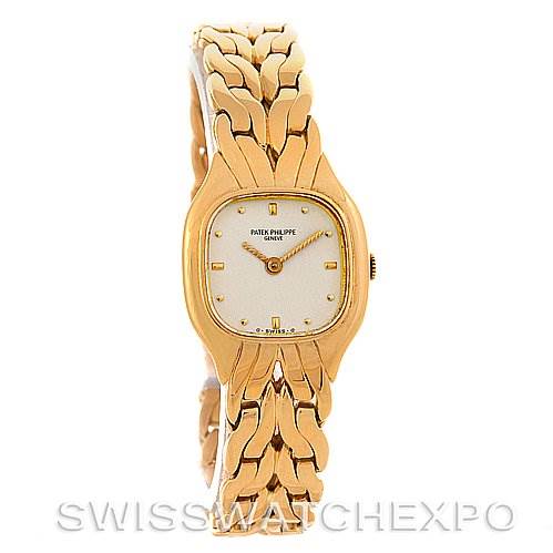 The image shows a front view of a Vintage Patek Philippe watch with a gold bracelet and white dial.