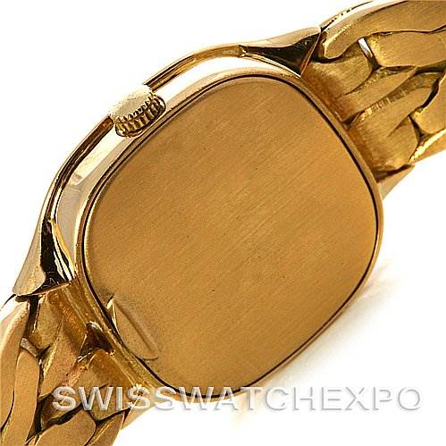 This image shows the case back and part of the bracelet of a Vintage Patek Philippe watch.
