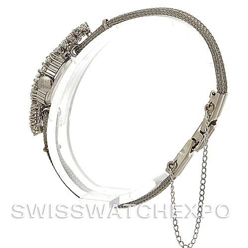 This image shows the side view of a Vintage Patek Philippe watch, highlighting its intricate bracelet and clasp mechanism.