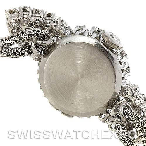 The image shows the back case and crown of a Vintage Patek Philippe watch, viewed from the rear angle.