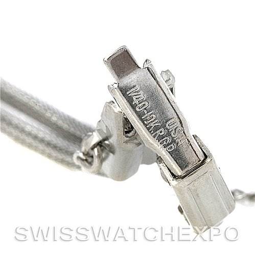 This image shows a close-up of the clasp and part of the bracelet of a Vintage Patek Philippe watch.