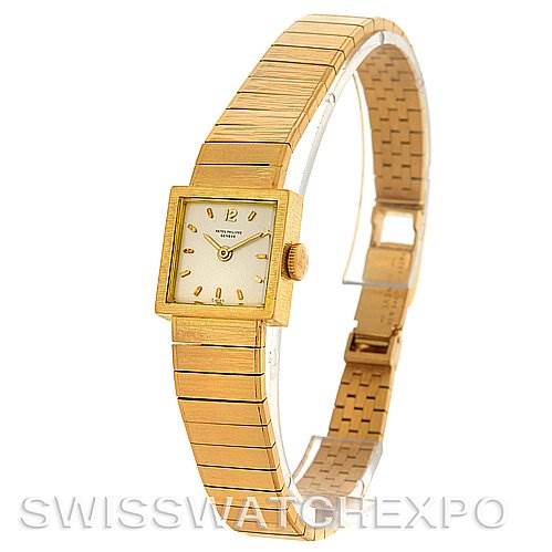 The image shows a side and top view of a Vintage Patek Philippe watch with a gold square case and integrated gold bracelet.